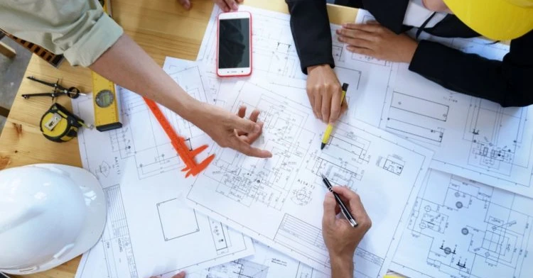 Ingegneri strutturisti dello Studio Capoferri durante una riunione tecnica — studio di ingegneria civile a Brescia, Bergamo e Milano